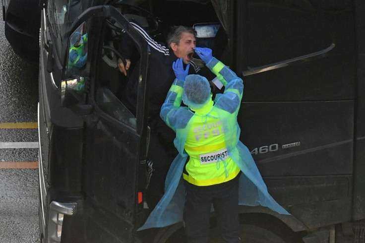 French emergency workers were among those helping to out carry out covid-19 tests on lorry drivers to help traffic get moving