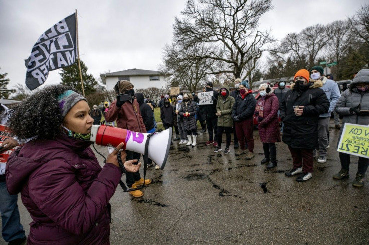 Protestors demonstrate against the police killing of Andre Hill in Columbus, Ohio, which sparked a fresh wave of outrage against racial injustice and police brutality