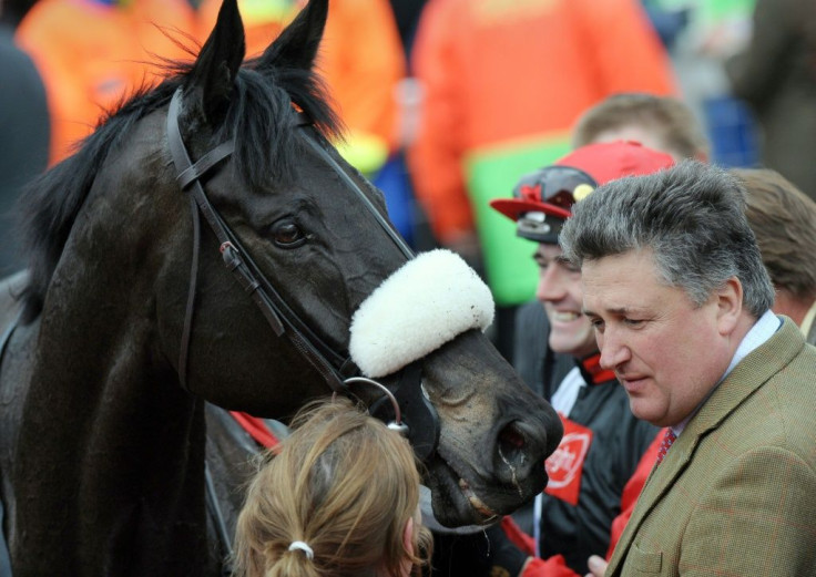 Trainer Paul Nicholls holds a strong hand in his bid to win a 12th King George VI Chase with two-time winner Clan des Obeaux and Cyrname heading his four runners