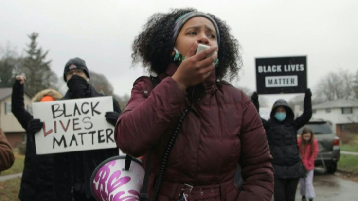 About 100 mourners hold a vigil in Columbus, Ohio after the killing of an unarmed African-American man by police, sparking a fresh wave of outrage against racial injustice and police brutality in the United States.