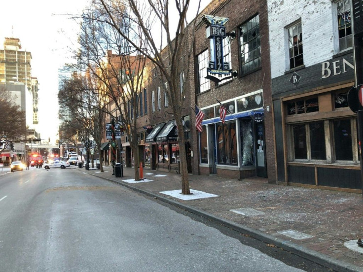 In this photo from the Twitter page of the Nashville Fire Department, damage is seen on a street after the explosion