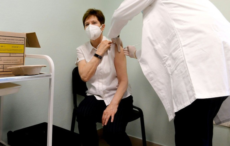 Doctor Adrienne Kertesz receives the first vaccination against the novel coronavirus at the South Pest Central Hospital in Budapest, Hungary