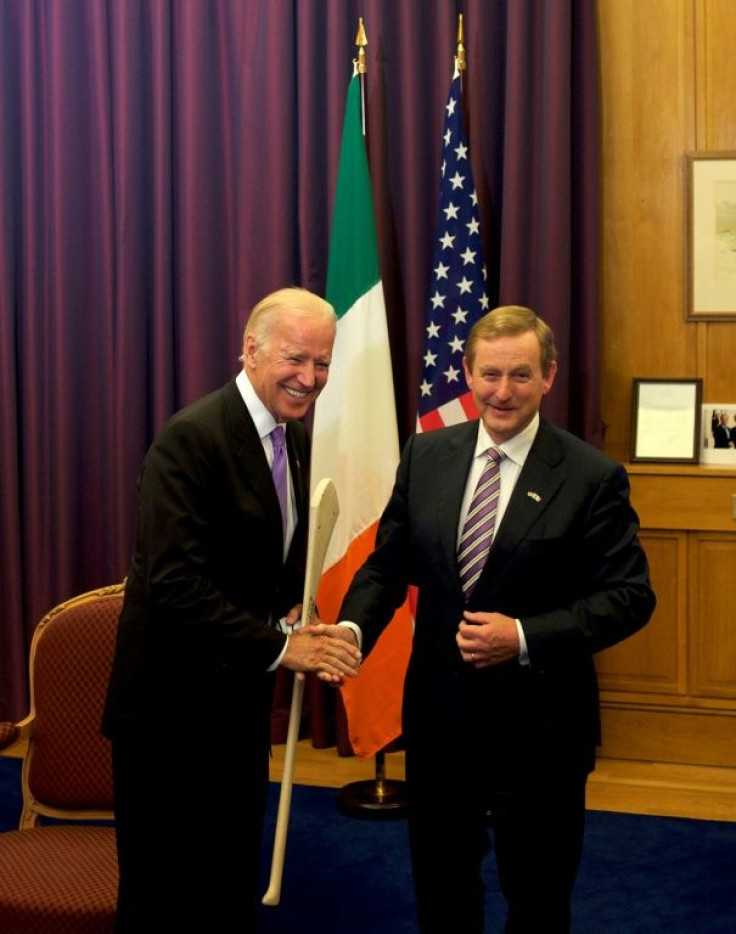 Then US vice president Joe Biden receives a hurl as a welcome gift from Ireland's then prime minister Enda Kenny, in Dublin in June 2016