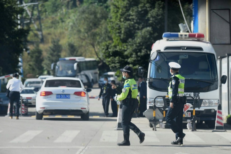 Police outside the Yantian District Detention Centre in Shenzhen, where the 12 Hong Kong democracy activists have been detained