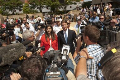 John Edwards and his daughter, Cate Edwards depart from the U.S. District Court in Winston-Salem North Carolina