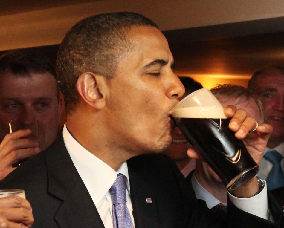 U.S. President Barack Obama drinks from a pint of Guinness stout at the Ollie Hayes pub in Moneygall