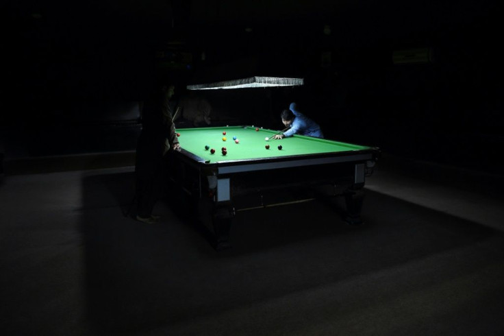 Every evening, young men head to the Arena club, a trendy cafe in Kandahar,  to play snooker, watch football on a big screen, orÂ smoke shisha