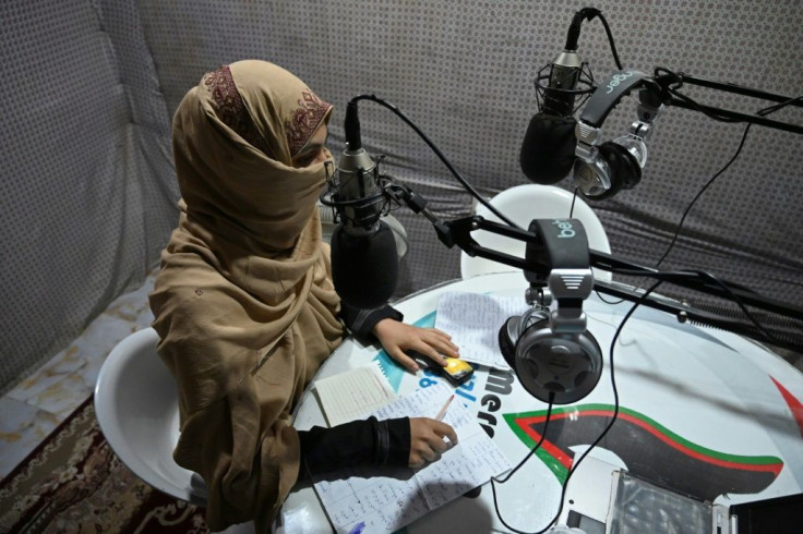 Disc jockey Habiba Quraishi, 19, speaks during a broadcast at the women-led Merman radio station