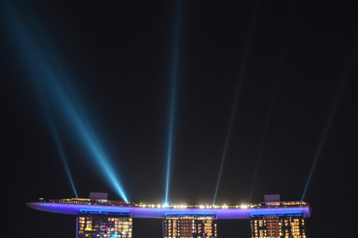 A light display is projected from the Marina Bay Sands hotel and resort as part of New Year's Eve celebrations in Singapore