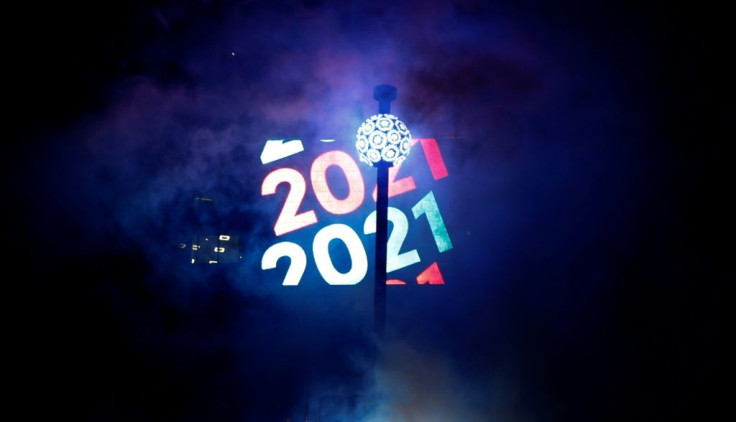 The ball is raised into place in Times Square, which has been closed off to the public during socially distanced New Year's Eve celebrations on December 31, 2020 in New York City