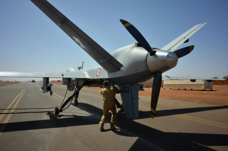 A French pilot checks an armed Reaper drone before take-off at the operation Barkhane's military base in Niger in December. France and Turkey are among the NATO members using such weaponised pilotless aircraft