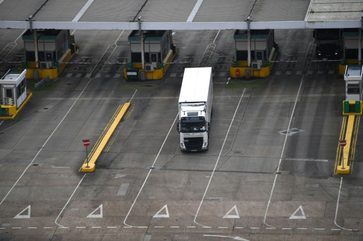 A small but steady stream of lorries arrived through Friday morning at the Port of Dover in southeast England