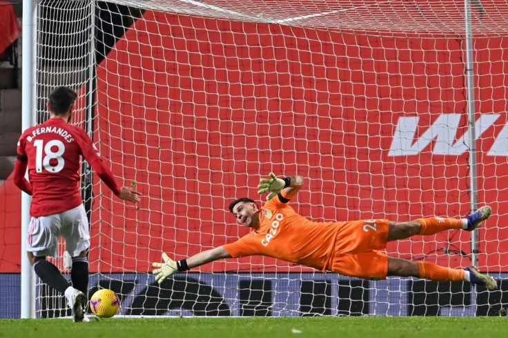 Spot on: Bruno Fernandes's (left)penalty took Manchester United level on points with Liverpool at the top of the Premier League