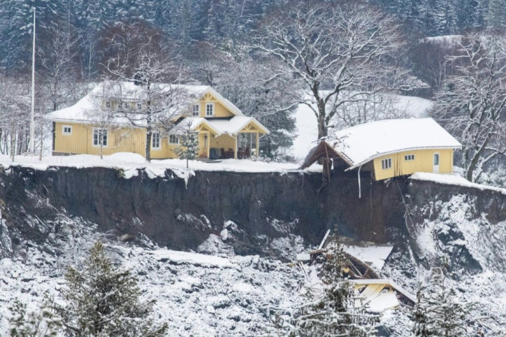 A landslide north of the Norwegian capital Oslo last Wednesday swallowed up or badly damaged homes like this one. Rescue workers say they still hope to find survivors in air pockets.