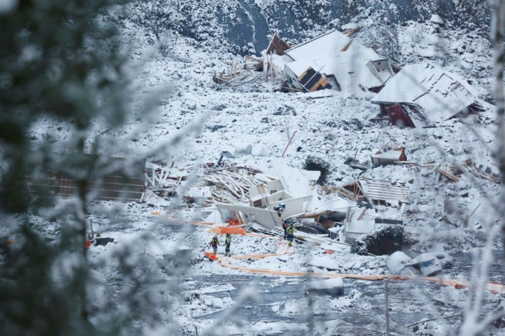 Rescue workers search for survivors