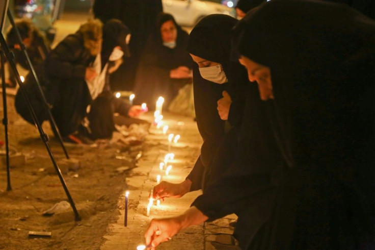 One of many vigils for the commanders was held in Iraq's central shrine city of Karbala on Saturday night