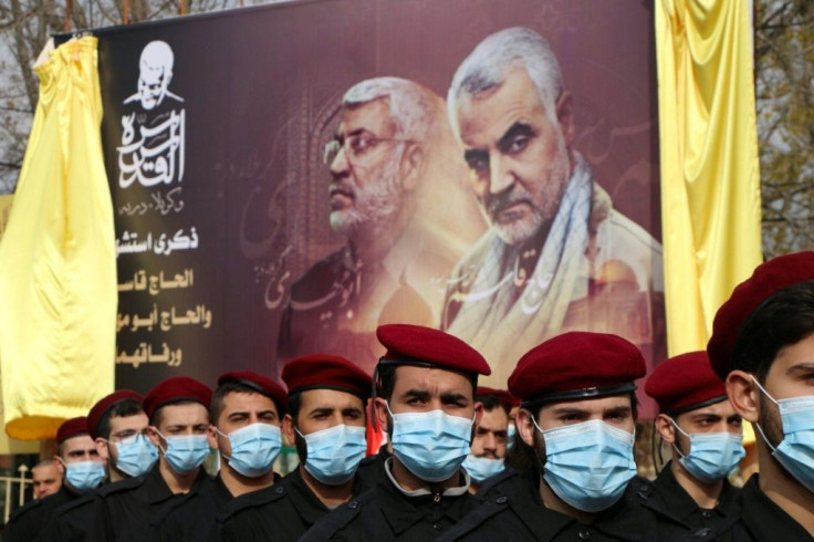 Members of Lebanon's Shiite Hezbollah movement parade Saturday in Baalbeck in the eastern Bekaa valley to honour the commanders killed in the US drone strike