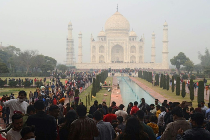 Crowds throng at the Taj Mahal over the weekend as India fights rising coronavirus infections