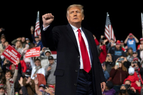 President Donald Trump (pictured December 2020), who still refuses to concede defeat to Democrat Joe Biden, will campaign in Georgia ahead of the state's double runoff election for the US Senate
