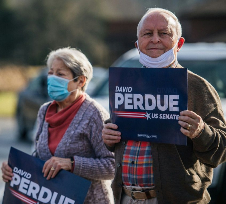 Supporters of Republican Georgia Senator David Perdue at a rally in Dillard, Georgia