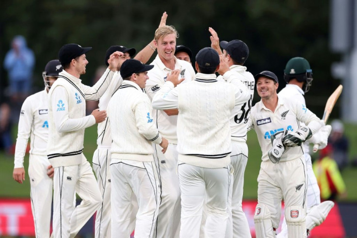 New Zealand's Kyle Jamieson (centre) celebrates taking the wicket of Shan Masood as Pakistan finished day three on 8-1 in Christchurch