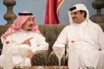 Saudi King Salman chats with Qatari emir Sheikh Tamim bin Hamad al-Thani in Doha in December 2016, six months before the Gulf crisis erupted