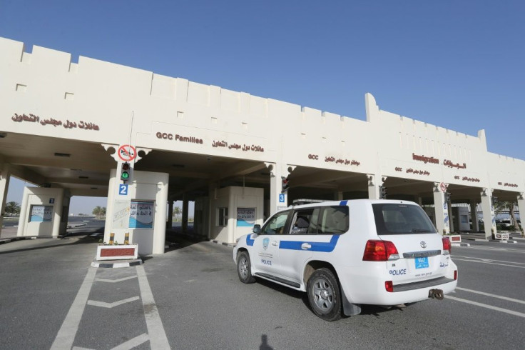 A lone police car surveys the closed Abu Samra border crossing between Qatar and Saudi Arabia in June 2017