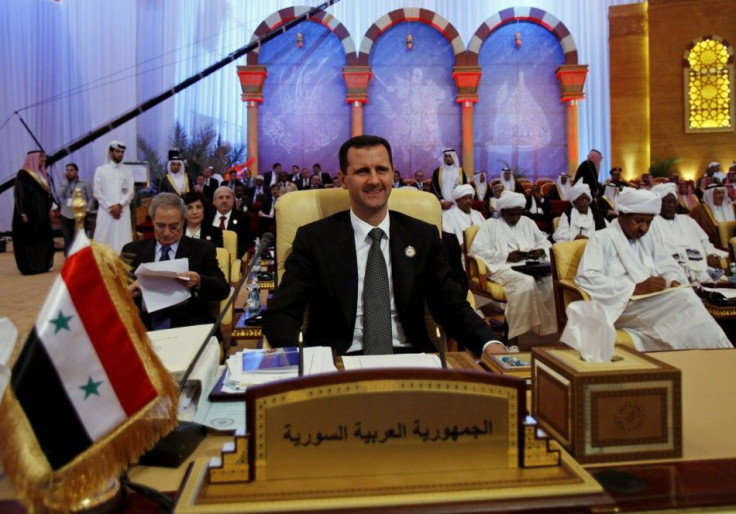 Syria&#039;s President Assad attends the final session of an Arab summit in Doha