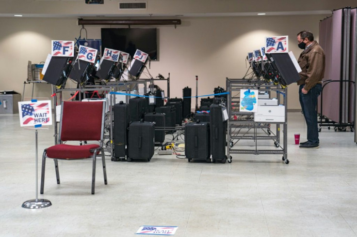 A man casts his ballot at a voting location in Cobb County, Georgia