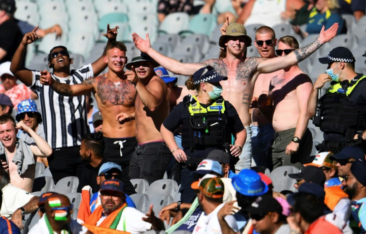 Fans chant at the Melbourne Cricket Ground last month. A spectator who was at the showpiece Boxing Day Australia-India Test has tested positive for coronavirus and fans seated nearby have been urged to get Covid tested and isolateÂ 