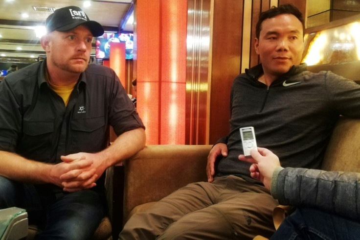 Dutch mountaineer Arnold Coster (L) and Chhang Dawa Sherpa, Nepali expedition manager and team leader of the K2 winter expedition