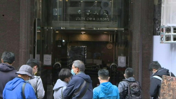 Hong Kong: Scene outside law firm where US solicitor among those arrested on security charge