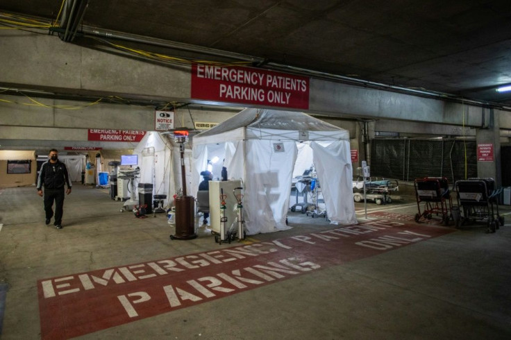 A temporary Emergency Room is built in a parking garage at Providence Cedars-Sinai Tarzana Medical Center in California as virus cases surge