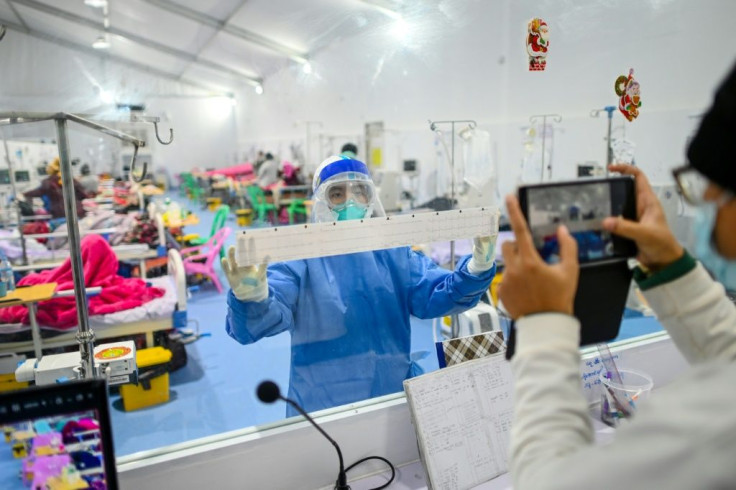 A doctor works in the intensive care unit of the Ayeyarwady Covid Center in Mandalay, Myanmar, amid the ongoing pandemic