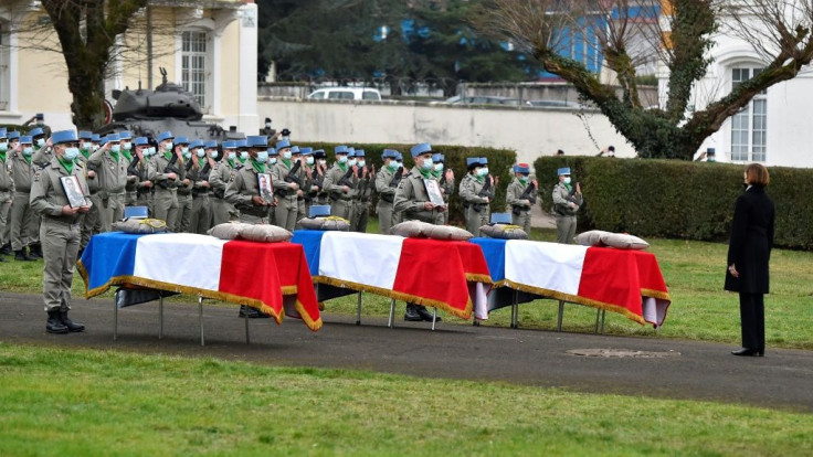 French Defence Minister Florence Parly, right, pays tribute on January 5, 2021, to three soldiers killed in Mali in late December.