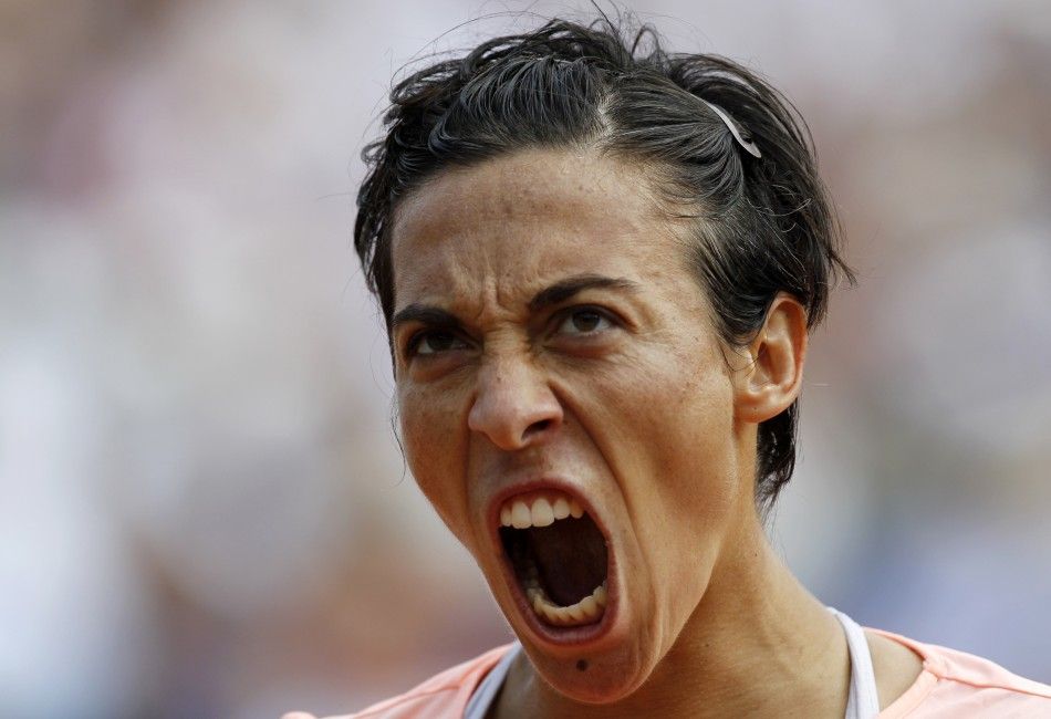 Schiavone of Italy reacts during her women039s final against Li Na of China at he French Open tennis tournament at the Roland Garros stadium in Paris.