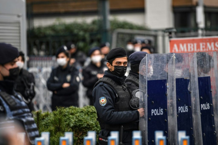Turkish anti riot police officers stand guard at the main gate of the Bogazici university on in Istanbul during a protest against the appointment of the new rector by the Turkish president.