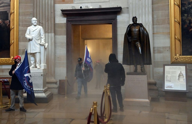 Supporters of US President Donald Trump enter the US Capitol's Rotunda