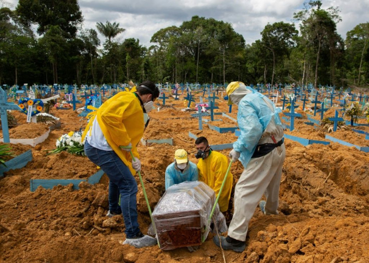 A burial takes place in an area reserved for COVID-19 victims at the Nossa Senhora Aparecida cemetery in Manaus, Brazil, on January 5, 2021