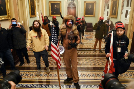 'American dozo': One of the rioters in the US Capitol reminded West Africans of traditional hunters in the vast, lawless Sahel region