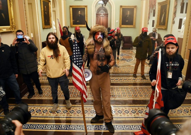'American dozo': One of the rioters in the US Capitol reminded West Africans of traditional hunters in the vast, lawless Sahel region