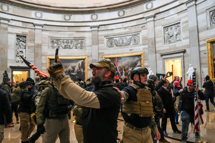 Trump supporters filming themselves in the Capitol Rotunda on January 6, 2021