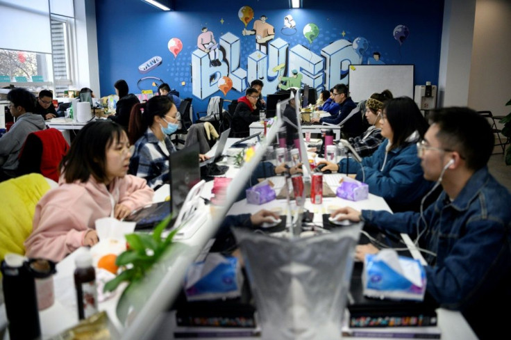Blued parent company BlueCity's sunlit Beijing campus teems with young programmers who hold meetings in rooms named after Oscar Wilde and other prominent LGBTQ figures