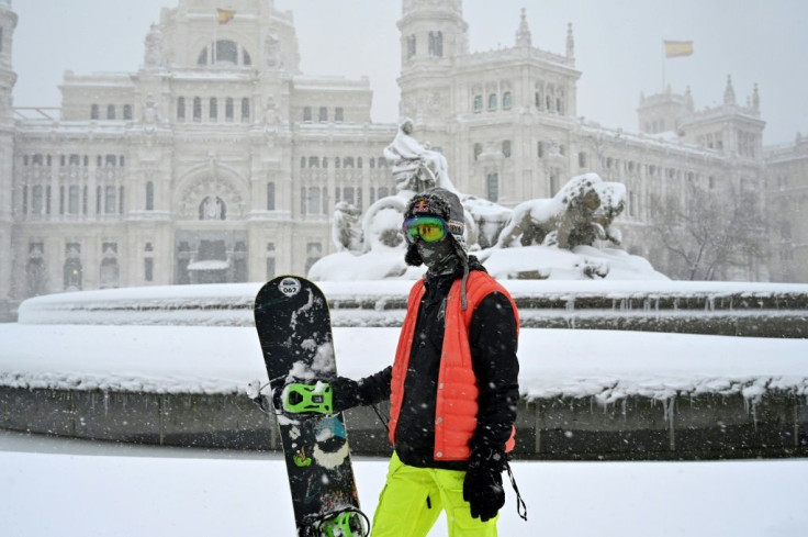 Skiers and snowboarders took took to the streets of Madrid Saturday