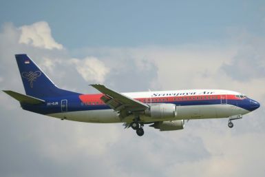 It was unclear how many passengers and crew were aboard the Boeing 737-500 operated by Sriwijaya Air
