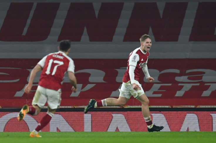 Arsenal midfielder Emile Smith Rowe (right) celebrates his winning goal against Newcastle in the FA Cup