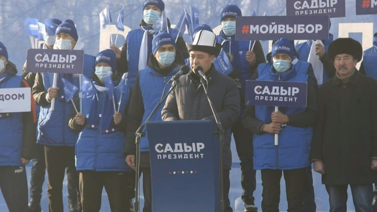 Frontrunner Japarov greets supporters at a campaign rally, three months after he languished in jail, mourning his parents and a son who all died whilst he was imprisoned