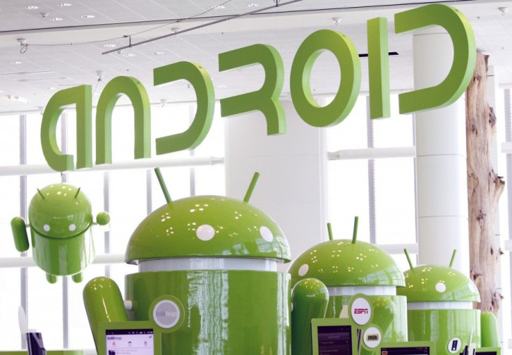 Android mascots are lined up in the demonstration area at the Google I/O Developers Conference in the Moscone Center in San Francisco.