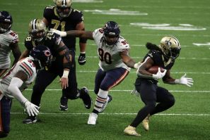 New Orleans running back Alvin Kamara runs with the ball in the Saints' NFL playoff victory over the Chicago Bears