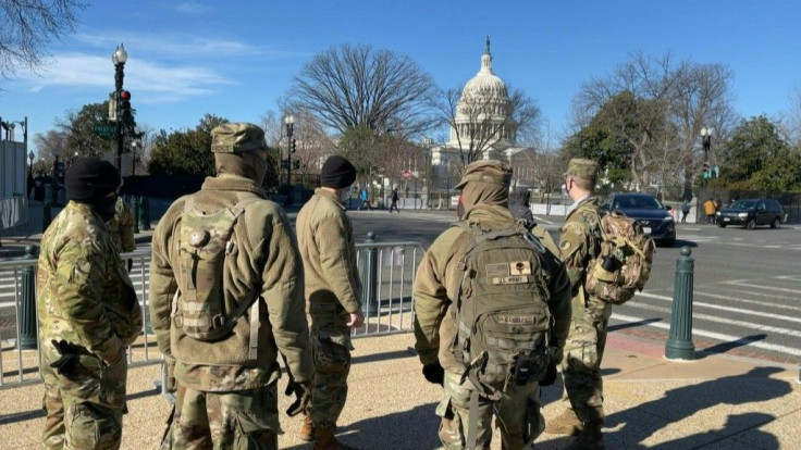 National Guard soldiers stand guard outside buildings around the US Capitol